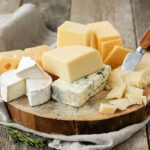 delicious-pieces-cheese_144627-43352